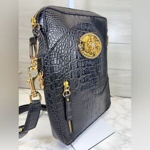 Elegant Black and Gold Embossed Shoulder Bag